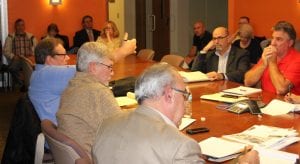 Photo by Sue Suchyta. Councilman Harry Sisko (second from left) discusses the proposed relocation of the city hall and police department to the site of the former Oakwood Health Care Center, 15915 Southfield Road, during a Municipal Complex Committee meeting while resident Ray Magusin (left), Councilwoman Gail McLeod (third from left), Councilmen Larry Templin and Kevin O'Rourke, City Treasurer Maureen Armstrong, C. E. Raines Engineer Souheil Sabak, Police Sgt. Wayne Albright, CDPA Architect Najim Saymuah, residents Rob and Nancy Simmonds, and Community Development Director Dave Boomer listen.