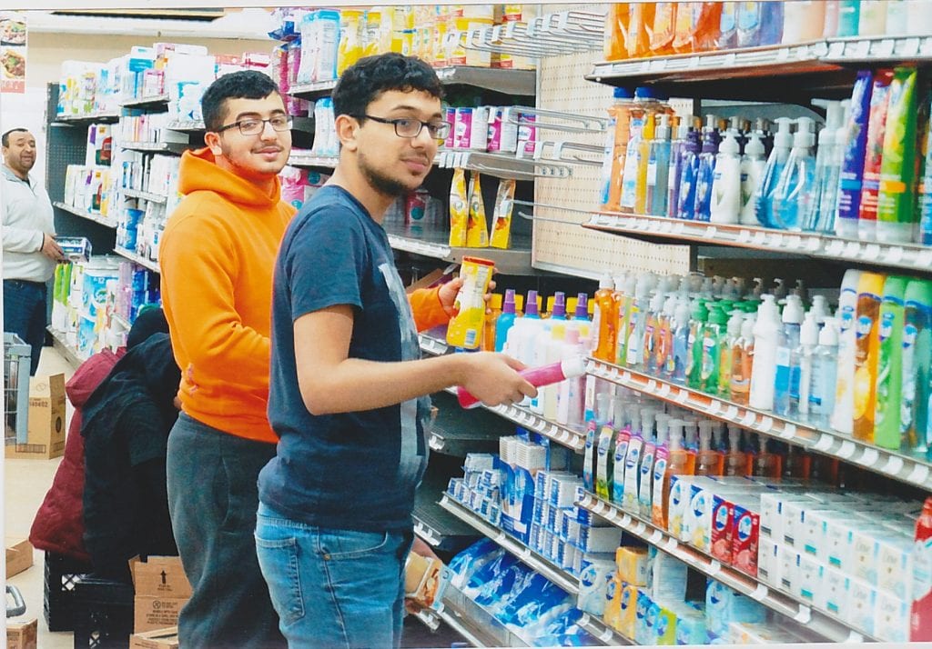 Photo by David Malhalab/M News Service Mohamad Koran (left) and Hassan Kourani of Dearborn are working hard to make sure that the new Ever Fresh Market, 20125 Ann Arbor Trail in Dearborn Heights, will be ready for its official opening, Jan. 16. The store has been refurbished, refreshed, renovated and made fresh and will emphasize customer service with a butcher, baker, fresh produce and international foods.