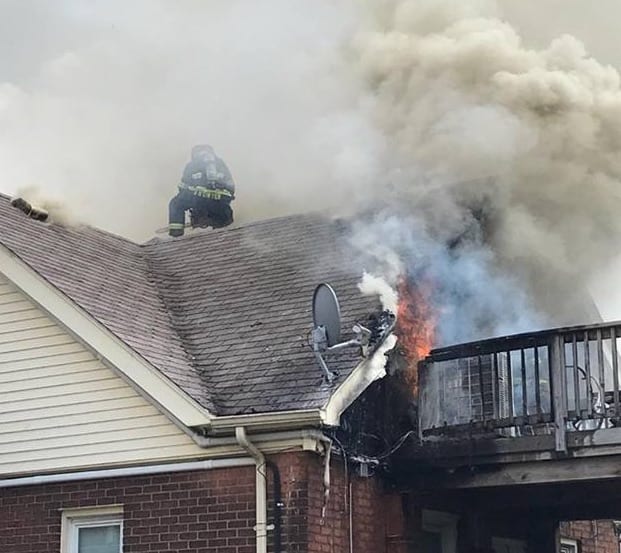 Photo courtesy of the Dearborn Firefighters Facebook Dearborn Fire Department Unit 3 battle a house fire in the 5000 block of Reuter July 19. The cause of the fire is said to be from an explosion at the back of the house. Firefighters responded to the house about 3 p.m. and put out the roof fire. No injuries were reported.