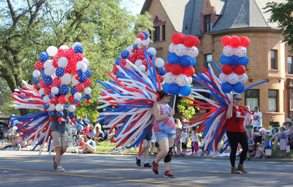 Photos by Sue Suchyta The sun shone on Wyandotte at 10 a.m. July 4 as crowds lined Biddle from Northline to Eureka for the city’s annual Independence Day Parade. Veterans organizations were strongly represented, including the Military Order of the Purple Heart (above), Veterans of Foreign Wars and the American Legion. Scouts, dance groups and arts organizations joined the parade, along with local politicians, the city's vintage base ball team, bands and the Moslem Temple Shriners on motorcycles, mini bikes, miniature cars, dressed as clowns and more.