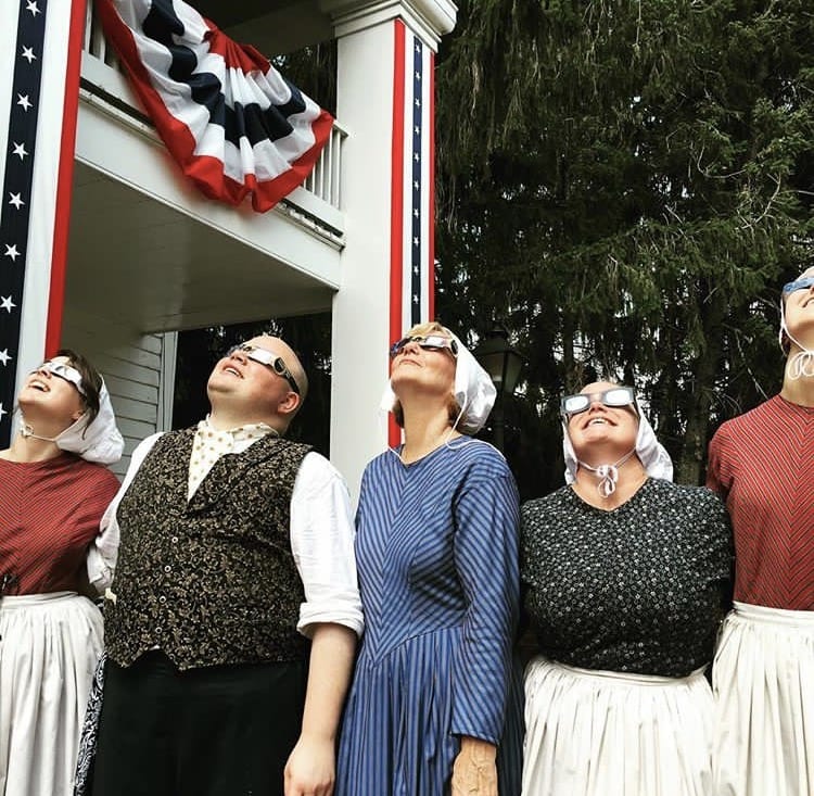 Photo by Joshua Beurer Greenfield Village 1850s presenters watch the solar eclipse in Dearborn,
