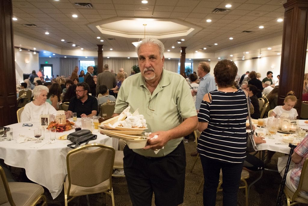 Photos by Ed Serecky A record number of patrons turned out for Pat D’Ambrosio’s fourth annual Pat’s Paws-itively Pasta Dinner fundraiser for Friends for Animals of Metro Detroit and the Dearborn Animal Shelter. Almost 400 packed Park Place, 23400 Park in Dearborn, Oct. 9 for D’Ambrosio’s mostaccioli and meatballs. Above, host Pat D’Ambrosio helps keep the party moving. Below, patrons receive helpings of Pat’s pasta.
