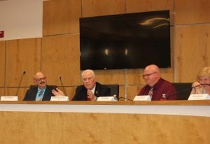 Photo by Sue Suchyta During the first meeting in the new Allen Park City Hall June 12, Mayor William Matakas (second from left) said that years ago, when Allen Park didn't have a large meeting space, the police would shut down part of Allen Road for a city meeting, officials would speak using a bullhorn and people wouldn't come out unless the weather was nice, as City Attorney Joseph Couvreur (left), City Administrator Mark Kibby (third from left) and City Councilwoman Gail McLeod react with amusement.