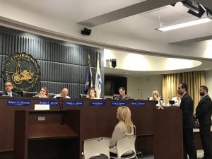 The Dearborn City Council questions attorney Clarence Dass (right) and 360 Hookah Lounge owner Taofik Muflihi regarding several issues at the establishment over the past year during a hearing at the Dearborn Administrative Center on June 27.