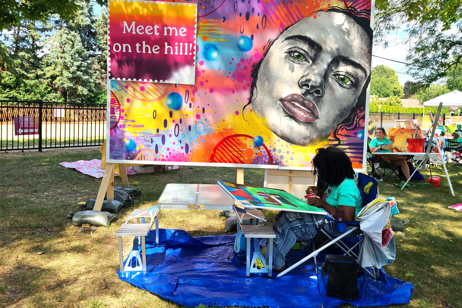 Artists brighten Homecoming during annual Paint Out in the Park event